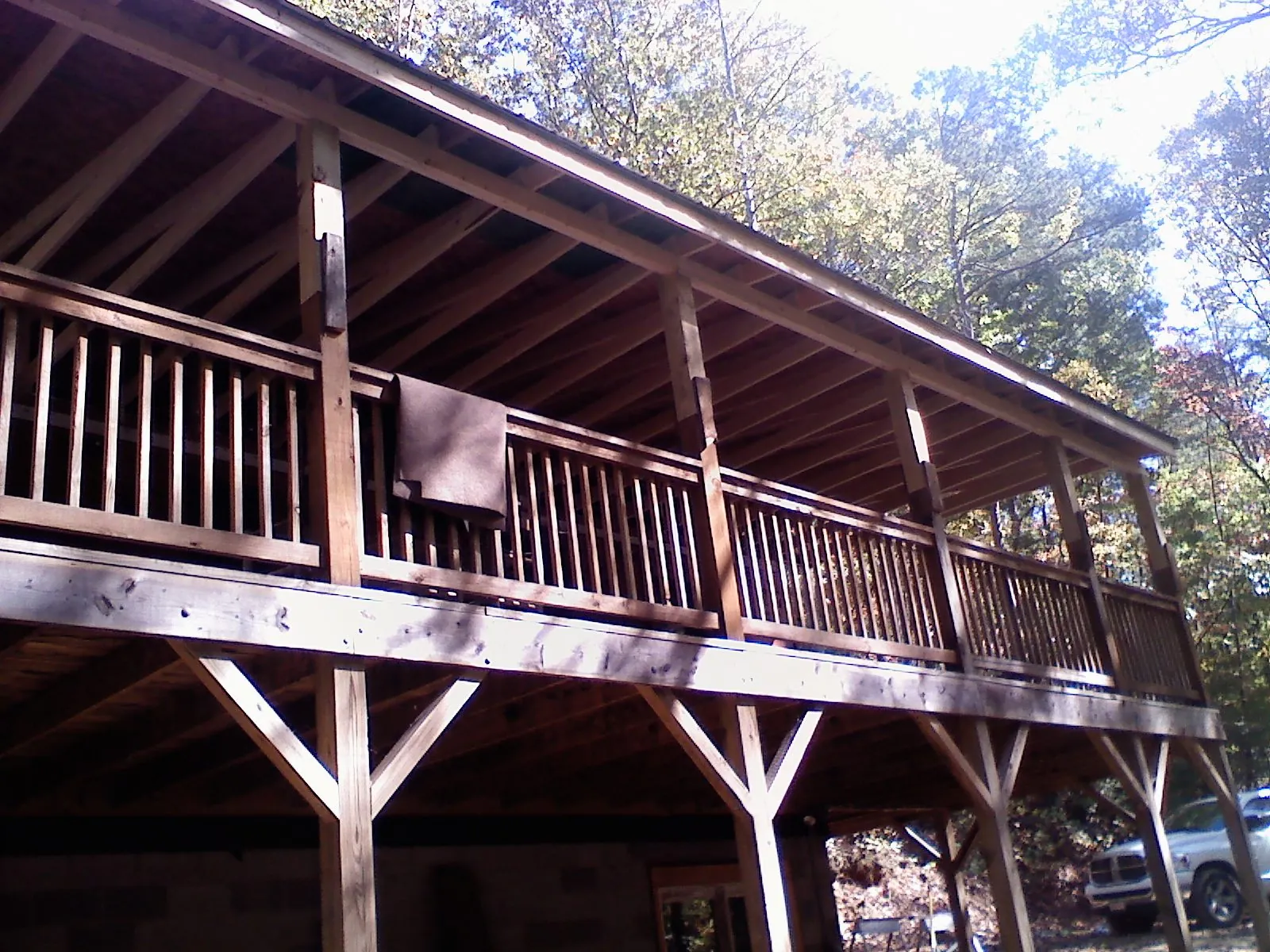 Timber framing under a new elevated porch and deck — Roof Leak Repair in Union Mills by Roofing Brothers